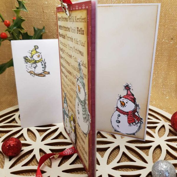 carte animée noël bonhomme de neige skiant avec enveloppe intérieur